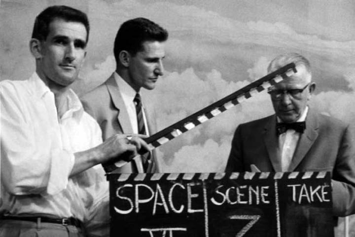 Old black and white movie scene image with three men